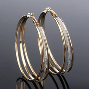 Boucles d'oreilles créoles rétro dorées